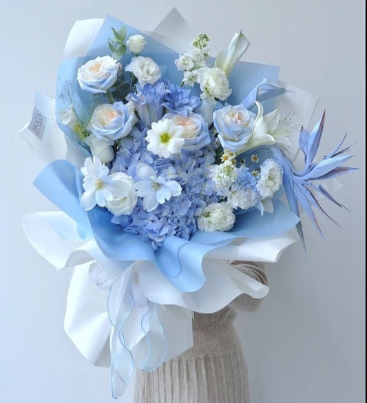 Blue roses and Hydrangeas arrangiments for any occasion flowers.