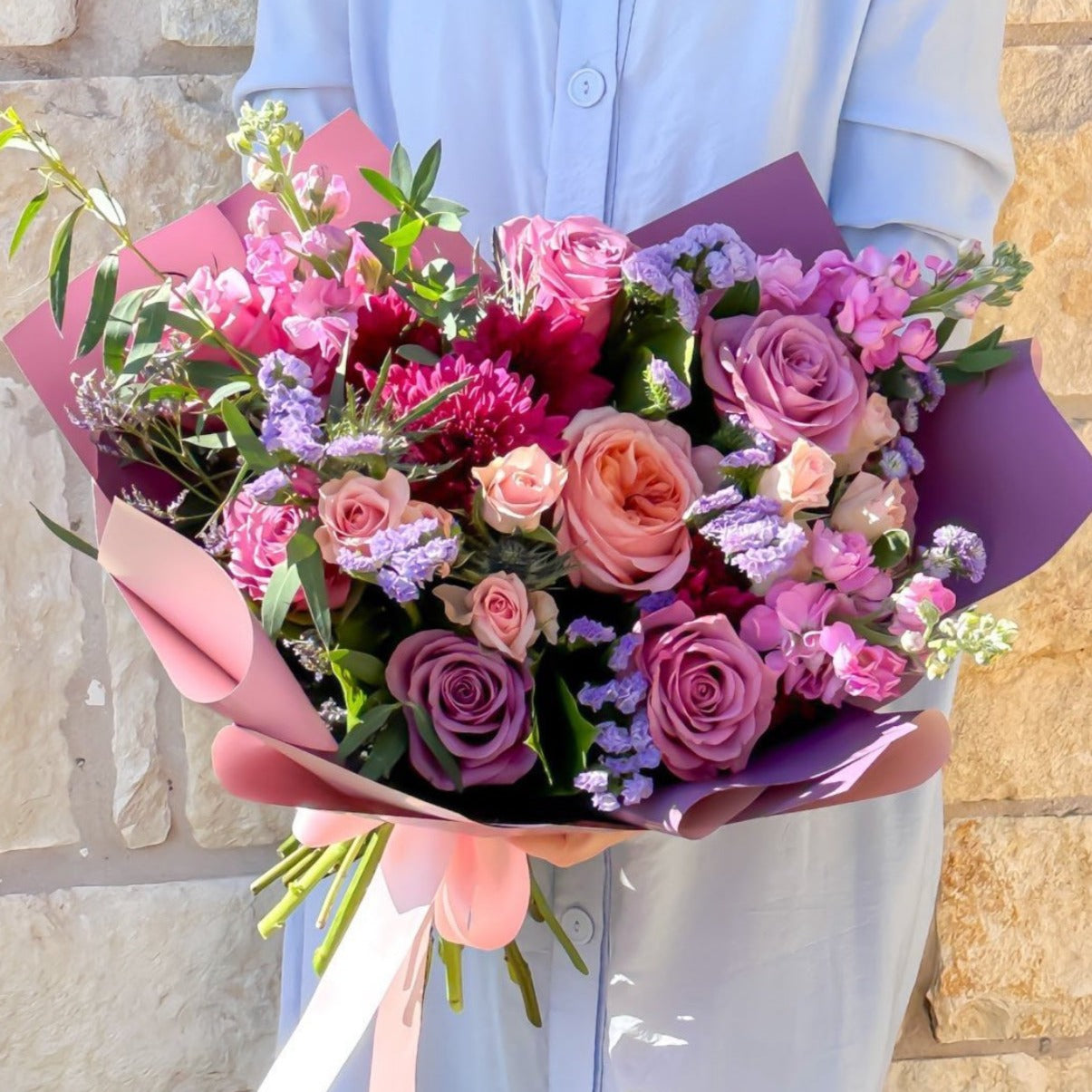 Large bouquet of roses, and Spring flowers.